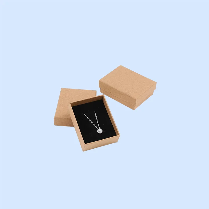 Jewelry box tray with dividers keeping four pieces from touching each other